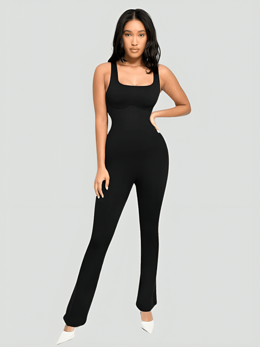 Flared shapewear jumpsuit romper with shaping seamless curve-enhancing design. Square neck, low back, fitted style in black, Outerwear shapewear, shapewear outerwear, Waist cinching, Waist snatching, snatched, Hidden shapwear, built-in shapewear, shapewear technology, stretchy, compression, arm slimming, tummy control, body contouring, best shapewear for women, shapewear on sale, Canadian shapewear brand, skims, spanx, popilush, shapermint. Feelin girl.