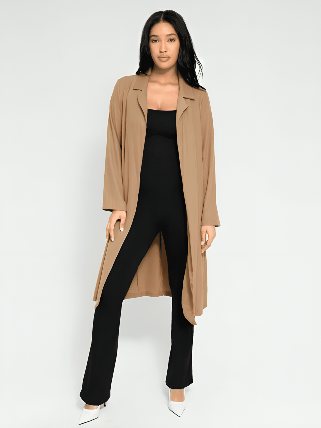 Flared shapewear jumpsuit romper with shaping seamless curve-enhancing design. Square neck, low back, fitted style in black, Outerwear shapewear, shapewear outerwear, Waist cinching, Waist snatching, snatched, Hidden shapwear, built-in shapewear, shapewear technology, stretchy, compression, arm slimming, tummy control, body contouring, best shapewear for women, shapewear on sale, Canadian shapewear brand, skims, spanx, popilush, shapermint. Feelin girl.