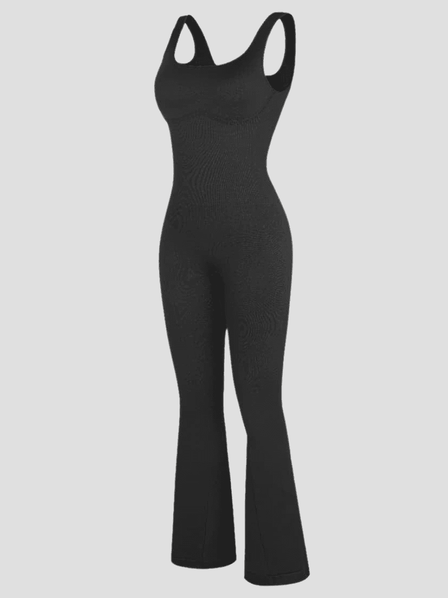 Flared shapewear jumpsuit romper with shaping seamless curve-enhancing design. Square neck, low back, fitted style in black, Outerwear shapewear, shapewear outerwear, Waist cinching, Waist snatching, snatched, Hidden shapwear, built-in shapewear, shapewear technology, stretchy, compression, arm slimming, tummy control, body contouring, best shapewear for women, shapewear on sale, Canadian shapewear brand, skims, spanx, popilush, shapermint. Feelin girl.
