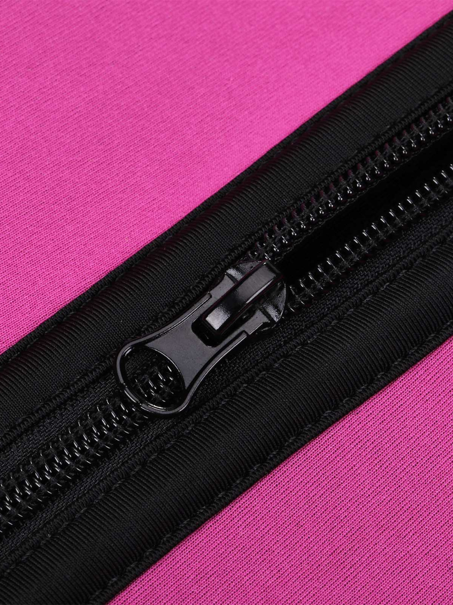 Pink sauna activewear vest being unzipped in a close-up image of the zipper.