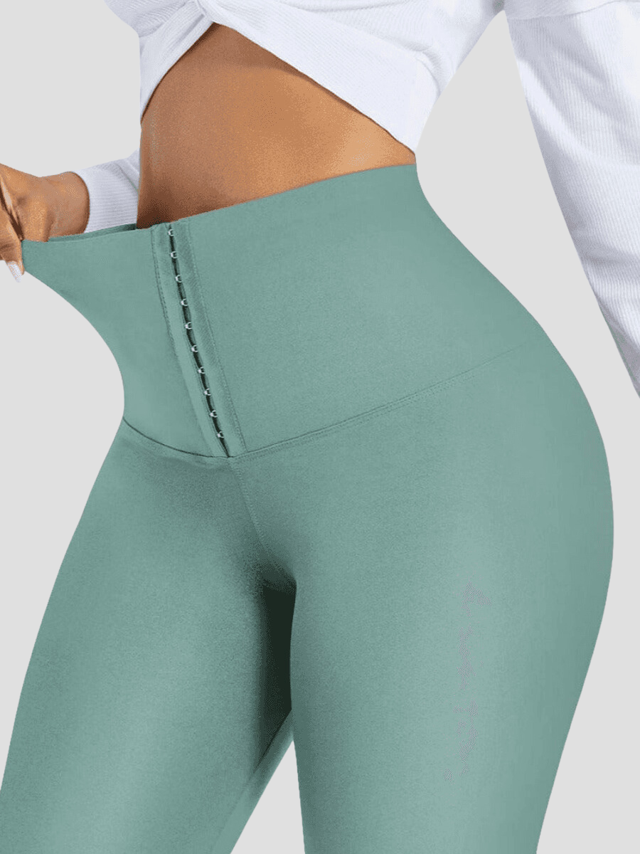 Waist Training Leggings, teal, Turquoise, Corset Leggings, Activewear, booty-boosting, booty lifting, bum lifting, workout clothes for women, sweat-wicking, high compression, cellulite smoothing, waist cinching, BBL, seamless, squat proof, plus size gym outfits, high waisted, breathable, nike, under armour, adidas, puma, champion, bombshell activewear, gymshark women, Girlfriend Collective, lululemon, Alo Yoga, Bandier, Athleta, Athletica, Fabletics.
