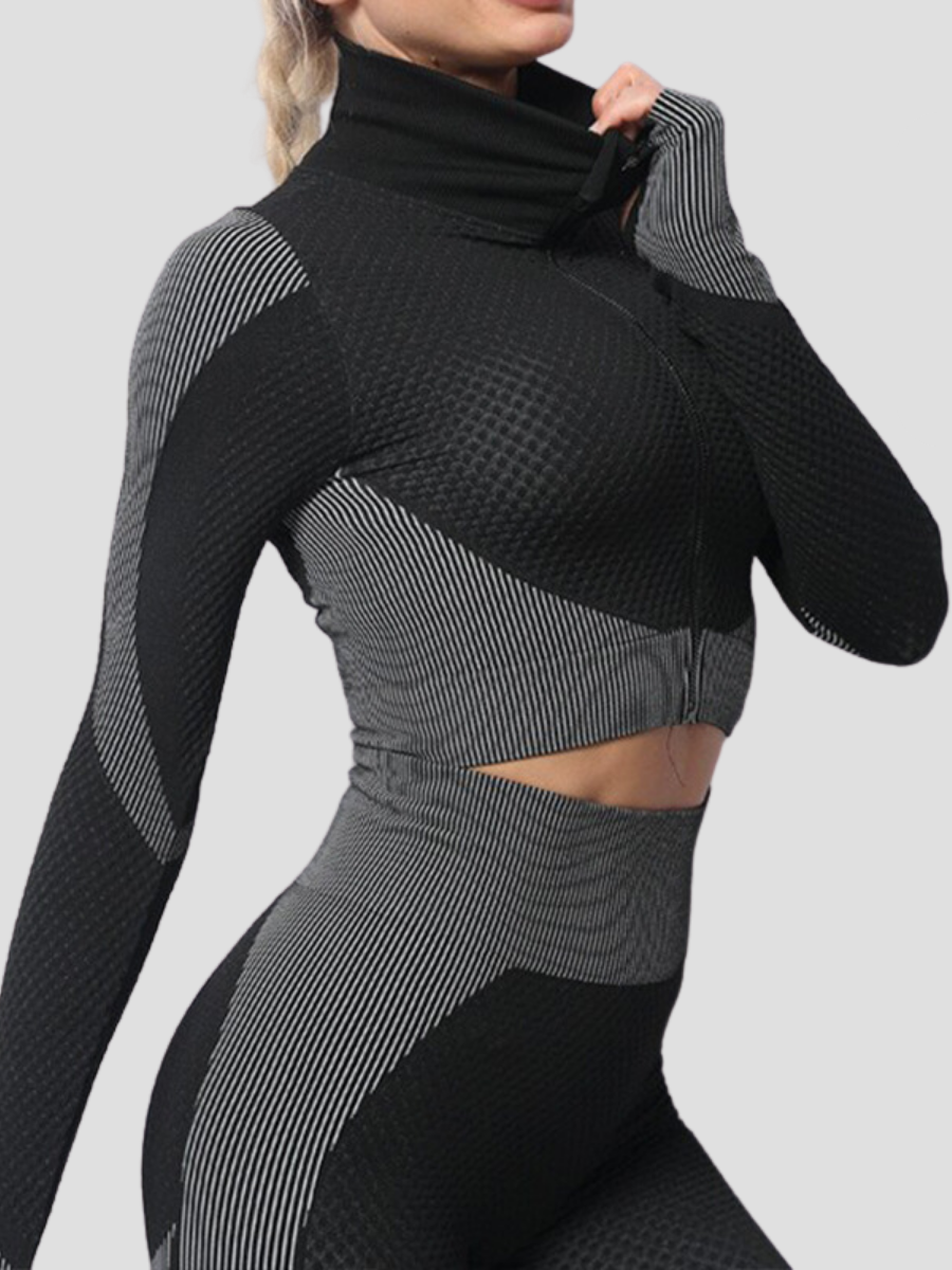 BBL Jacket, Cropped athletic set top with zipper stretchy jacket, workout outfit, athleisure, activewear, activewear sets, workout clothes for women, sweat-wicking, high compression, cellulite smoothing, BBL Jacket, plus size gym outfits, workout wear, gym wear, athletic outfits, nike, under armour, adidas, puma, champion, bombshell activewear, gymshark women, Girlfriend Collective, lululemon, Alo Yoga, Bandier, Athleta, Athletica, Fabletics, Revenge body, black, grey, gray, silver.
