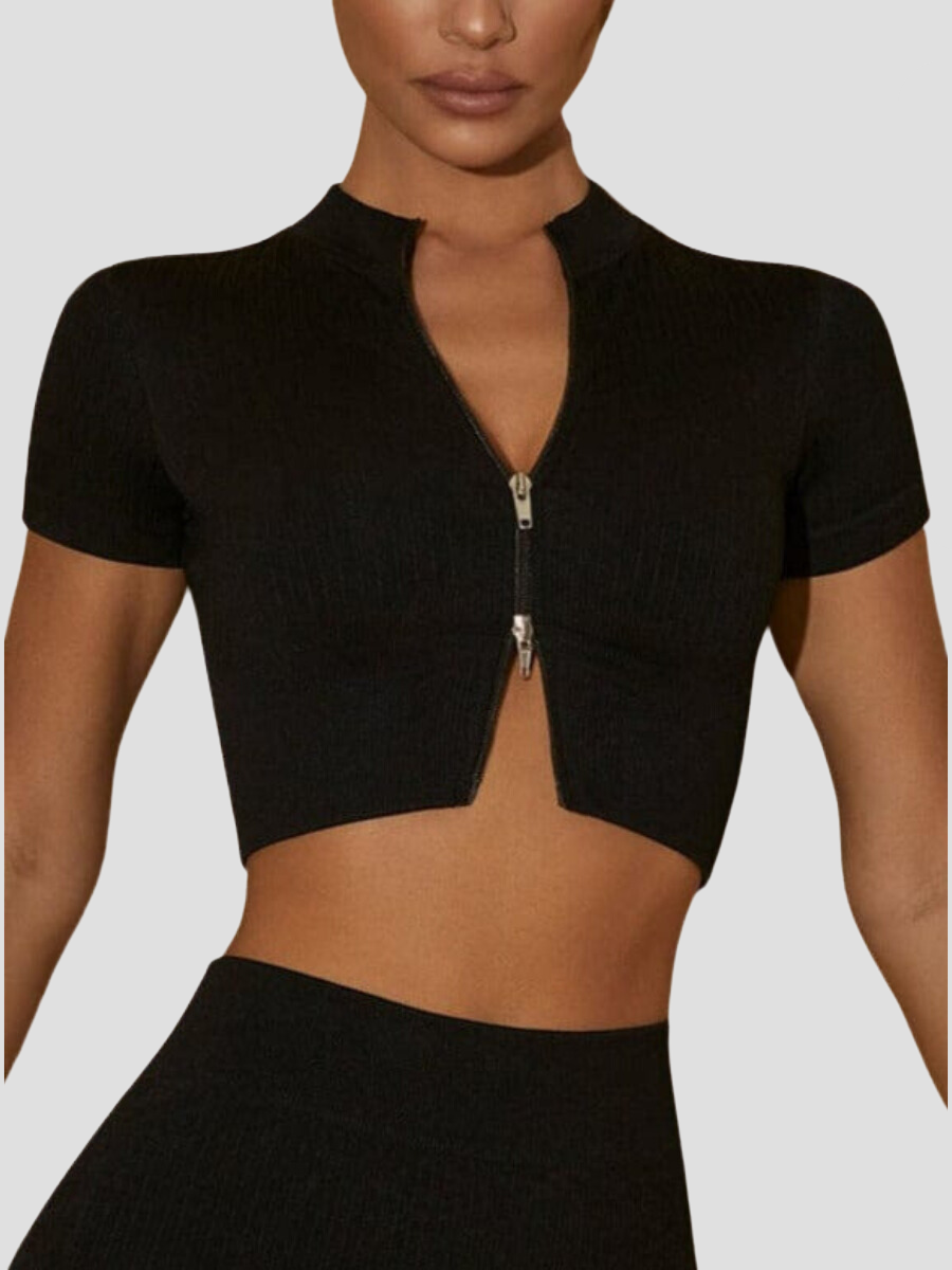 Shorts sleeved fitted zippered activewear top workout yoga breast support, Cropped athletic set top with zipper stretchy jacket, workout outfit, athleisure, activewear, activewear sets, workout clothes for women, sweat-wicking, high compression, cellulite smoothing, workout wear, gym wear, athletic outfits, nike, under armour, adidas, puma, champion, bombshell activewear, gymshark women, Girlfriend Collective, lululemon, Athleta, Athletica, Fabletics, Revenge body, black.
