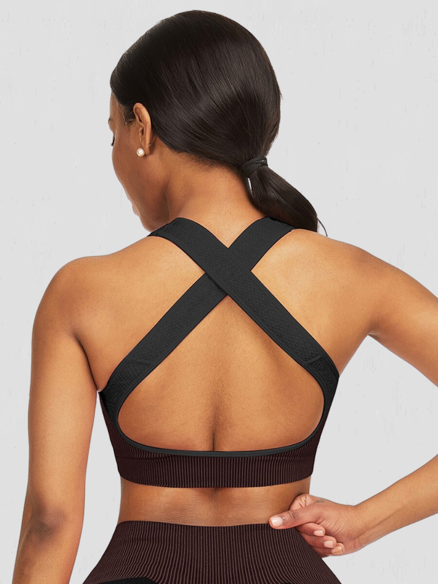 Black sports bra matching workout activewear athletic set crisscross supportive underwear, Activewear, activewear sets, sports bra, workout clothes for women, sweat-wicking, high compression, cellulite smoothing, seamless, workout wear, gym wear, athletic outfits, nike, under armour, adidas, puma, champion, bombshell activewear, gymshark women, Girlfriend Collective, lululemon, Alo Yoga, Bandier, Athleta, Athletica, Fabletics, Revenge body, Aqua, Black.