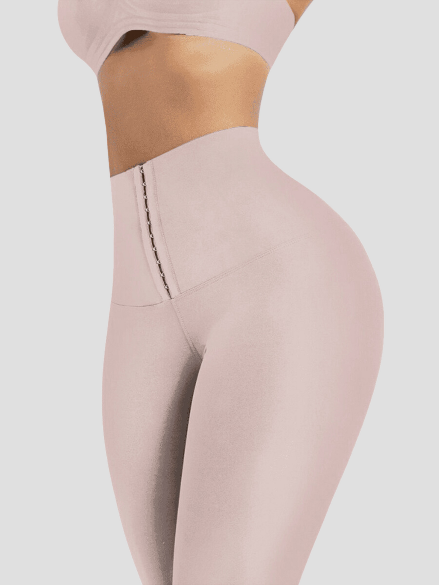 Waist Training Leggings, pink, Corset Leggings, Activewear, booty-boosting, booty lifting, bum lifting, workout clothes for women, sweat-wicking, high compression, cellulite smoothing, waist cinching, BBL, seamless, squat proof, plus size gym outfits, high waisted, breathable, nike, under armour, adidas, puma, champion, bombshell activewear, gymshark women, Girlfriend Collective, lululemon, Alo Yoga, Bandier, Athleta, Athletica, Fabletics.