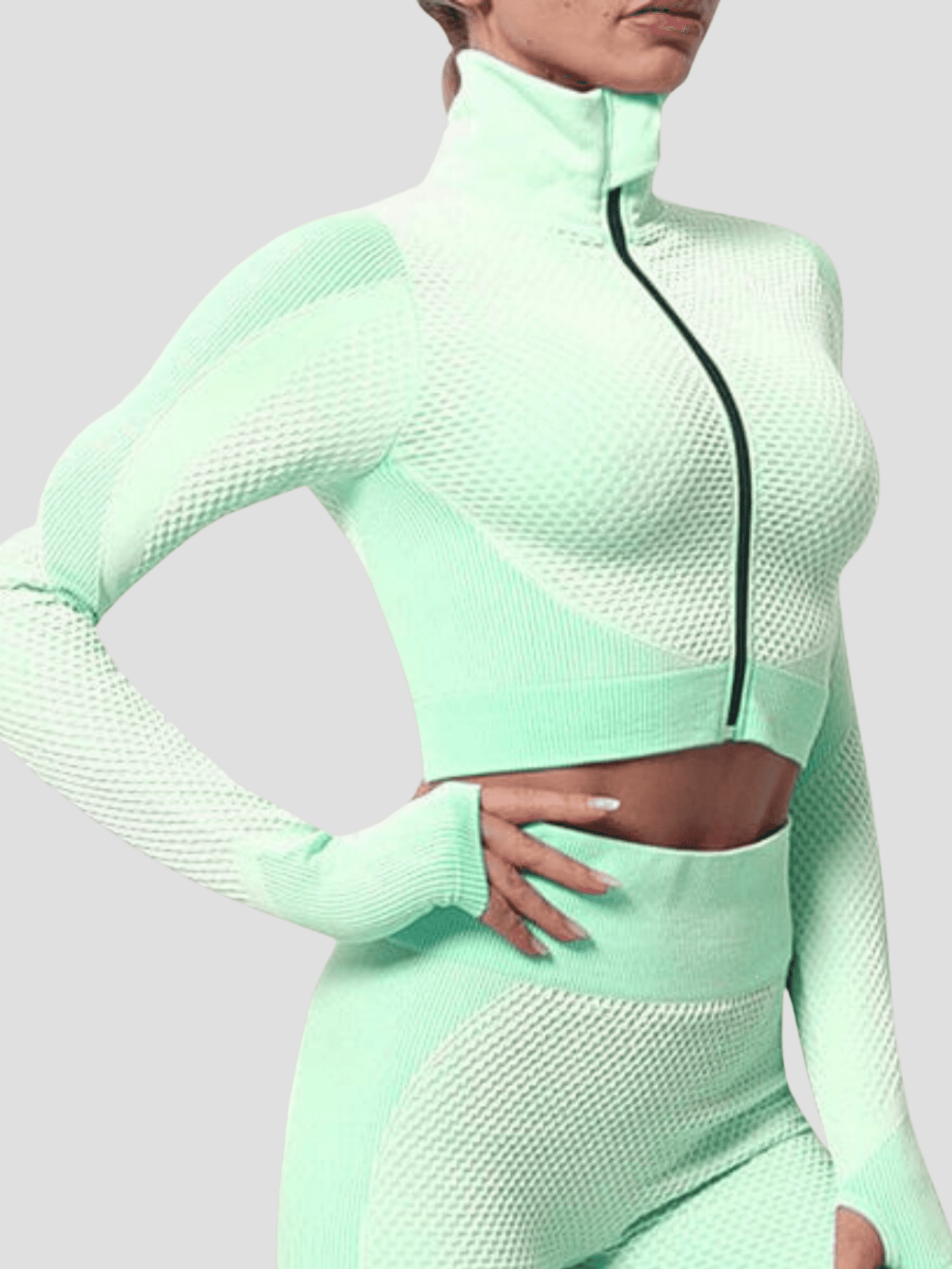 Cropped athletic set top with zipper stretchy jacket, workout outfit, athleisure, activewear, activewear sets, workout clothes for women, sweat-wicking, high compression, cellulite smoothing, BBL Jacket, plus size gym outfits, workout wear, gym wear, athletic outfits, nike, under armour, adidas, puma, champion, bombshell activewear, gymshark women, Girlfriend Collective, lululemon, Alo Yoga, Bandier, Athleta, Athletica, Fabletics, Revenge body, Teal Blue, Green.