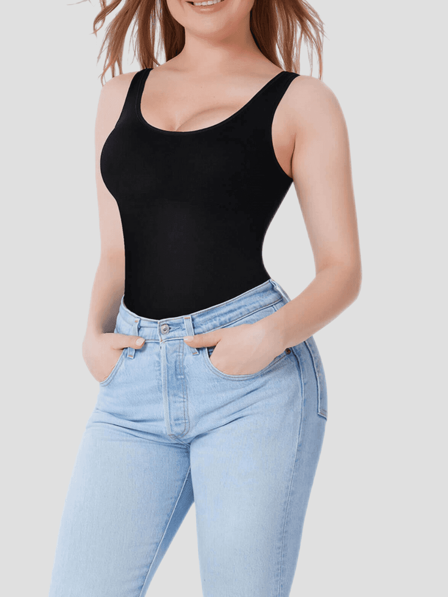 Shapewear top tank cami black tummy control breast support shaping tank. Outerwear shapewear, shapewear outerwear, Waist cinching, Waist snatching, snatched, Hidden shapwear, built-in shapewear, shapewear technology, stretchy, compression, arm slimming, tummy control, body contouring, best shapewear for women, shapewear on sale, Canadian shapewear brand, skims, spanx, popilush, shapermint. Feelin girl.