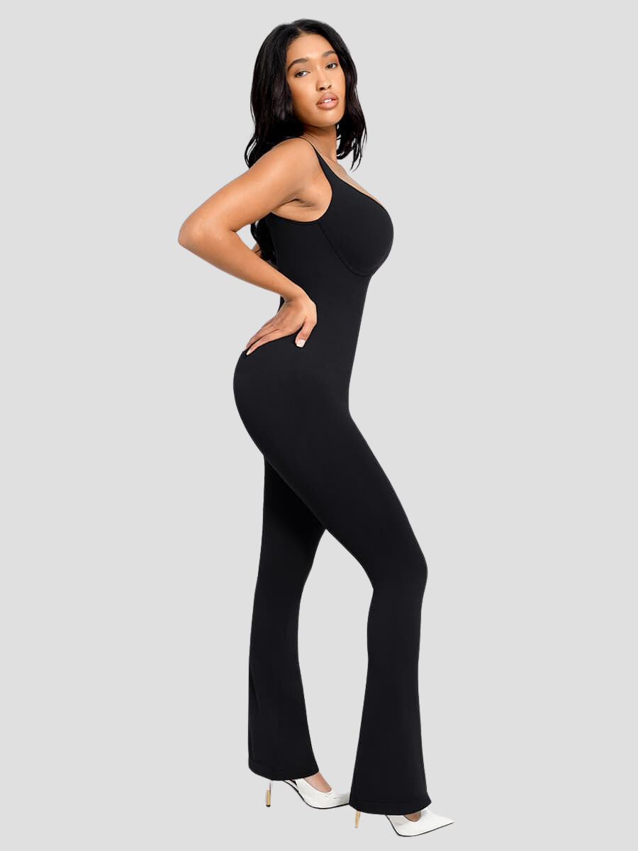 Flared shapewear jumpsuit romper with shaping seamless curve-enhancing design. Square neck, low back, fitted style in black, Outerwear shapewear, shapewear outerwear, Waist cinching, Waist snatching, snatched, Hidden shapwear, built-in shapewear, shapewear technology, stretchy, compression, arm slimming, tummy control, body contouring, best shapewear for women, shapewear on sale, Canadian shapewear brand, skims, spanx, popilush, shapermint. Feelin girl.