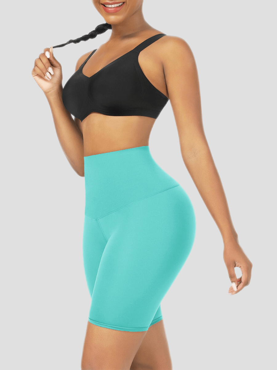 High waisted sauna shorts, teal. blue, Thigh-toning, Weight Loss shorts, Sweat Belt Shorts, Sauna Shorts. Sauna Activewear, workout clothes for women, sweat-wicking, cellulite smoothing, waist cinching, BBL, seamless, squat proof, plus size gym outfits, high waisted, breathable, nike, adidas, puma, champion, bombshell activewear, gymshark women, Girlfriend Collective, lululemon, Athleta, Athletica, Fabletics.