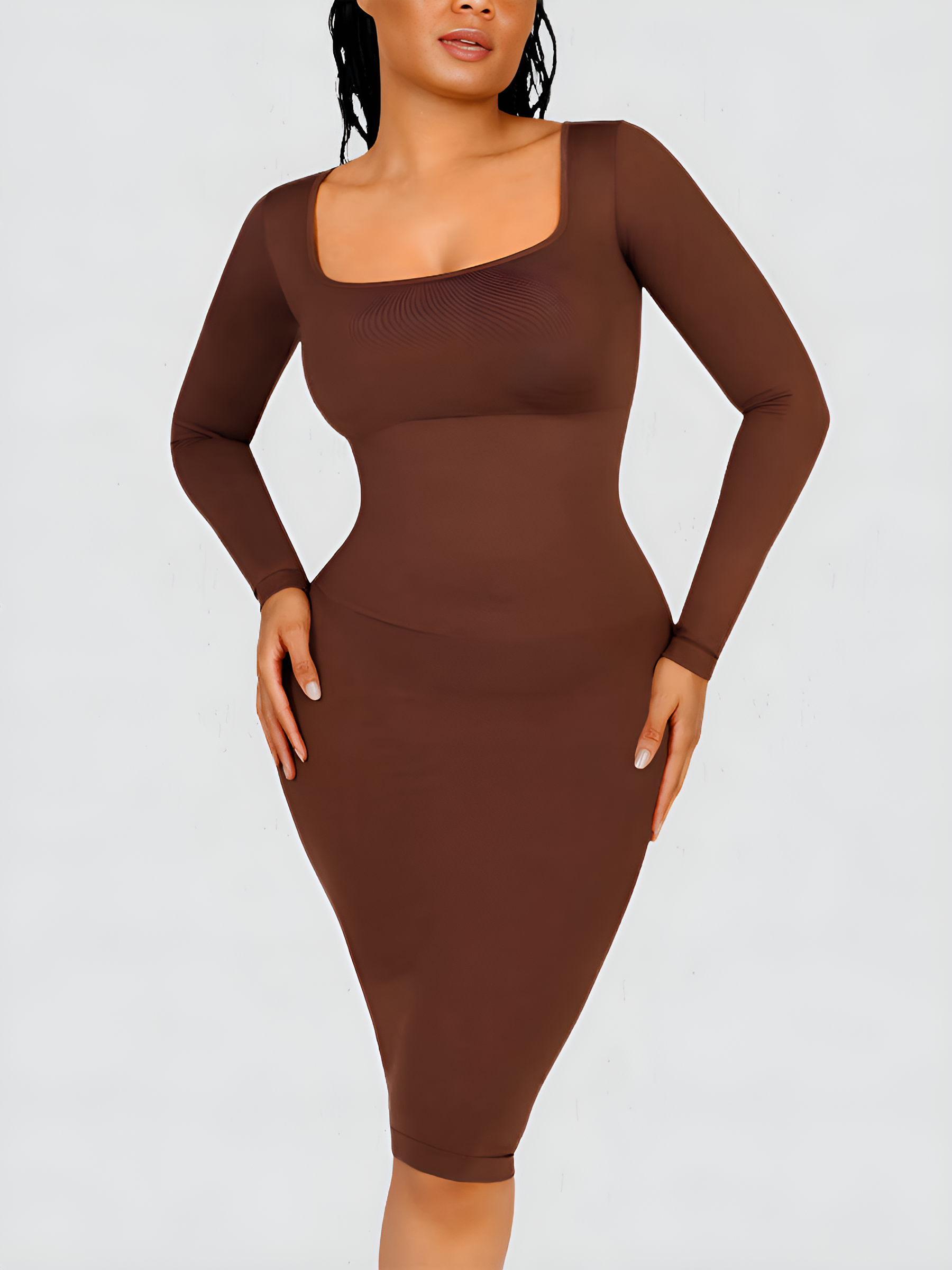 Woman posing in a brown long sleeve midi sculpting dress by BodyFlexx Shapewear.
