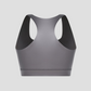 Close up of a silver neoprene sauna sports bra by BodyFexx from the back.