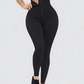 Woman wearing high-waisted black waist-training leggings with a corset-style closure to flatten her tummy and sculpt her curves.