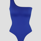 A royal blue off-the-shoulder-asymmetric shapewear bodysuit with built-in tummy control and a button thong back design for bathroom convenience.