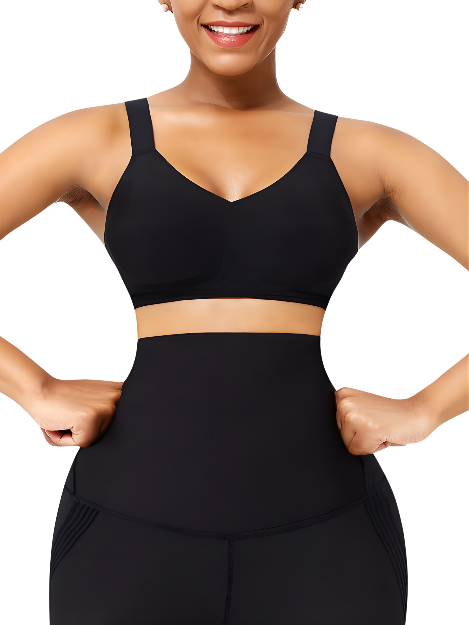 Woman with her hands on her hips wearing a black wireless seamless t-shirt bra with wide adjustable straps and adjustable padding.