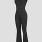 Black shaping jumpsuit romper with built-in shapewear and a flared leg design.