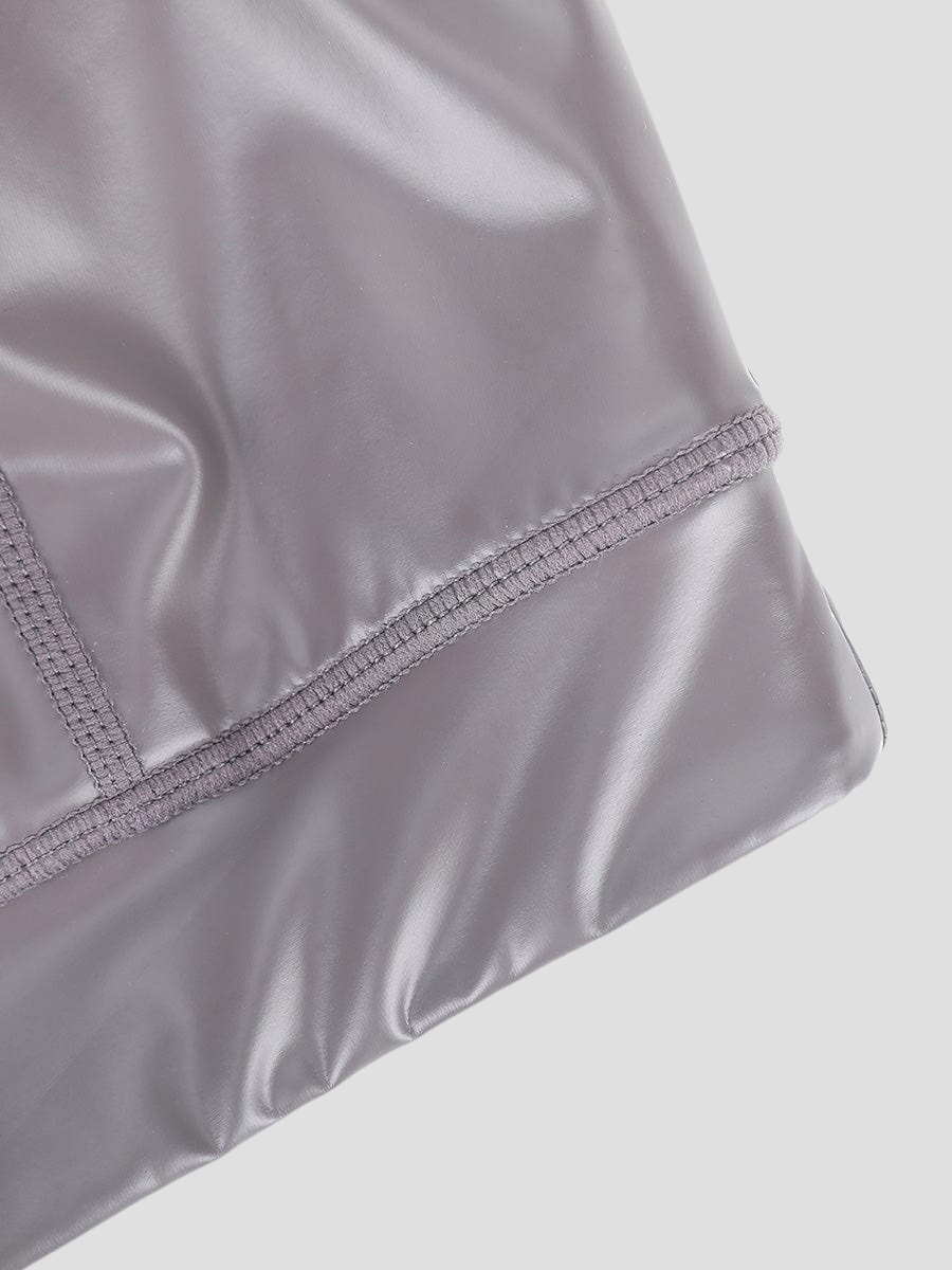 Close up of the stitching and fabric of BodyFlexx's silver metallic neoprene sauna sports bra.