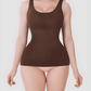 Woman wearing a brown shapewear tank top by BodyFlexx on a white background.