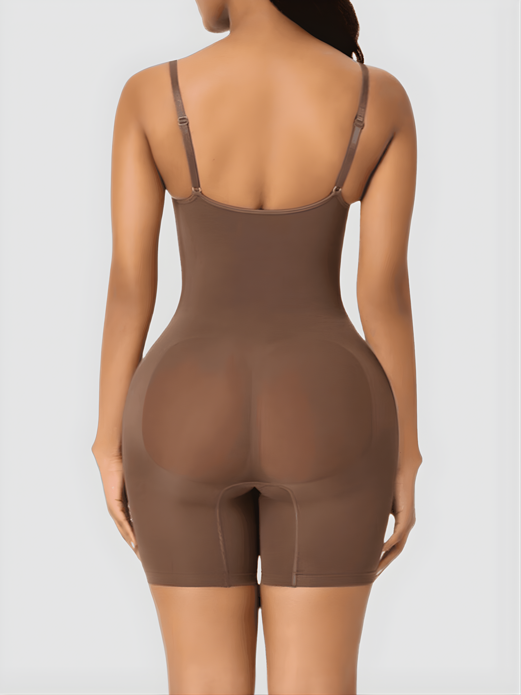 Woman wearing a brown bodysuit shaping garment designed by BodyFlexx Shapewear