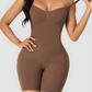 Model wearing the brown BodySculpt mid-thigh bodysuit shaper by BodyFlexx.