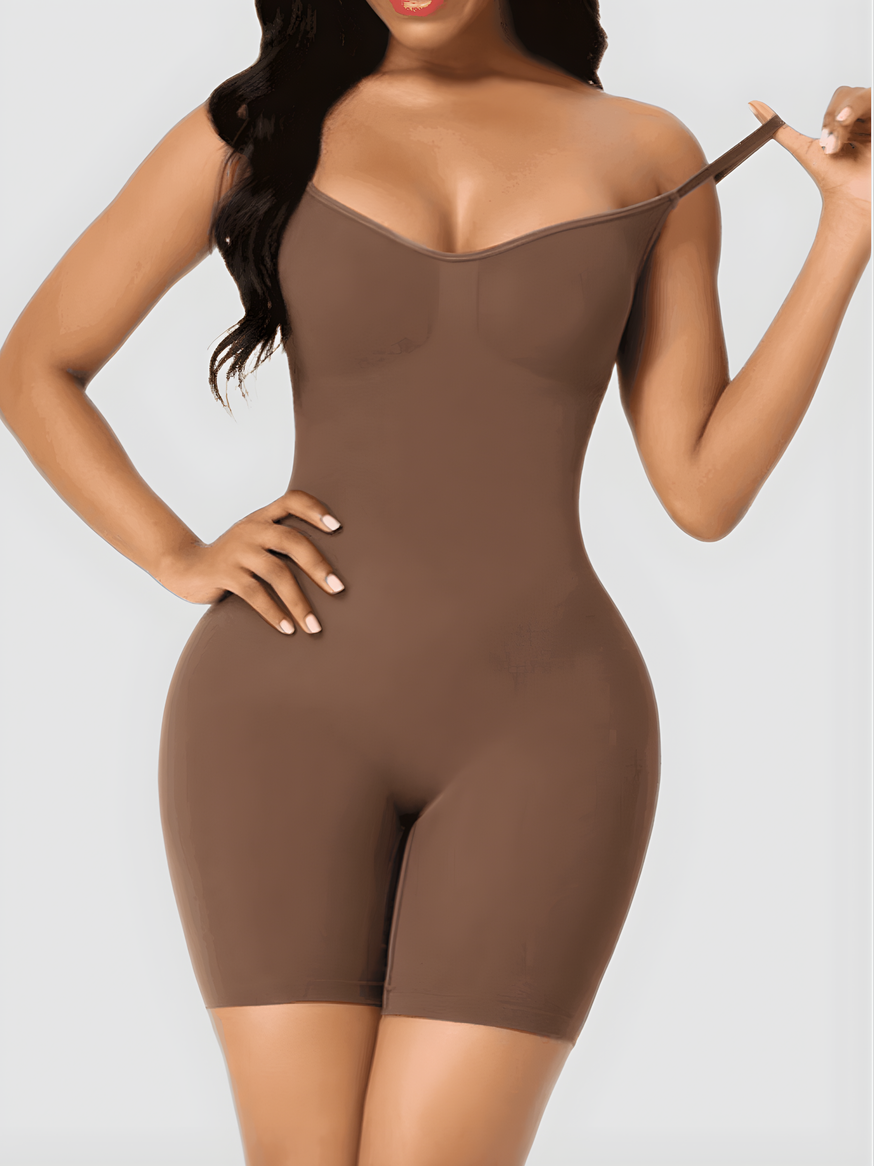 Model wearing the brown BodySculpt mid-thigh bodysuit shaper by BodyFlexx.