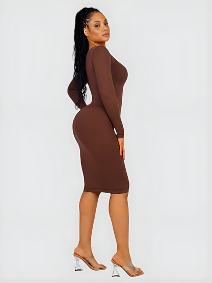 Woman wearing a long sleeve brown midi sculpting dress by BodyFlexx Shapewear.