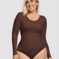 Woman wearing a brown long-sleeve shapewear bodysuit by BodyFlexx.