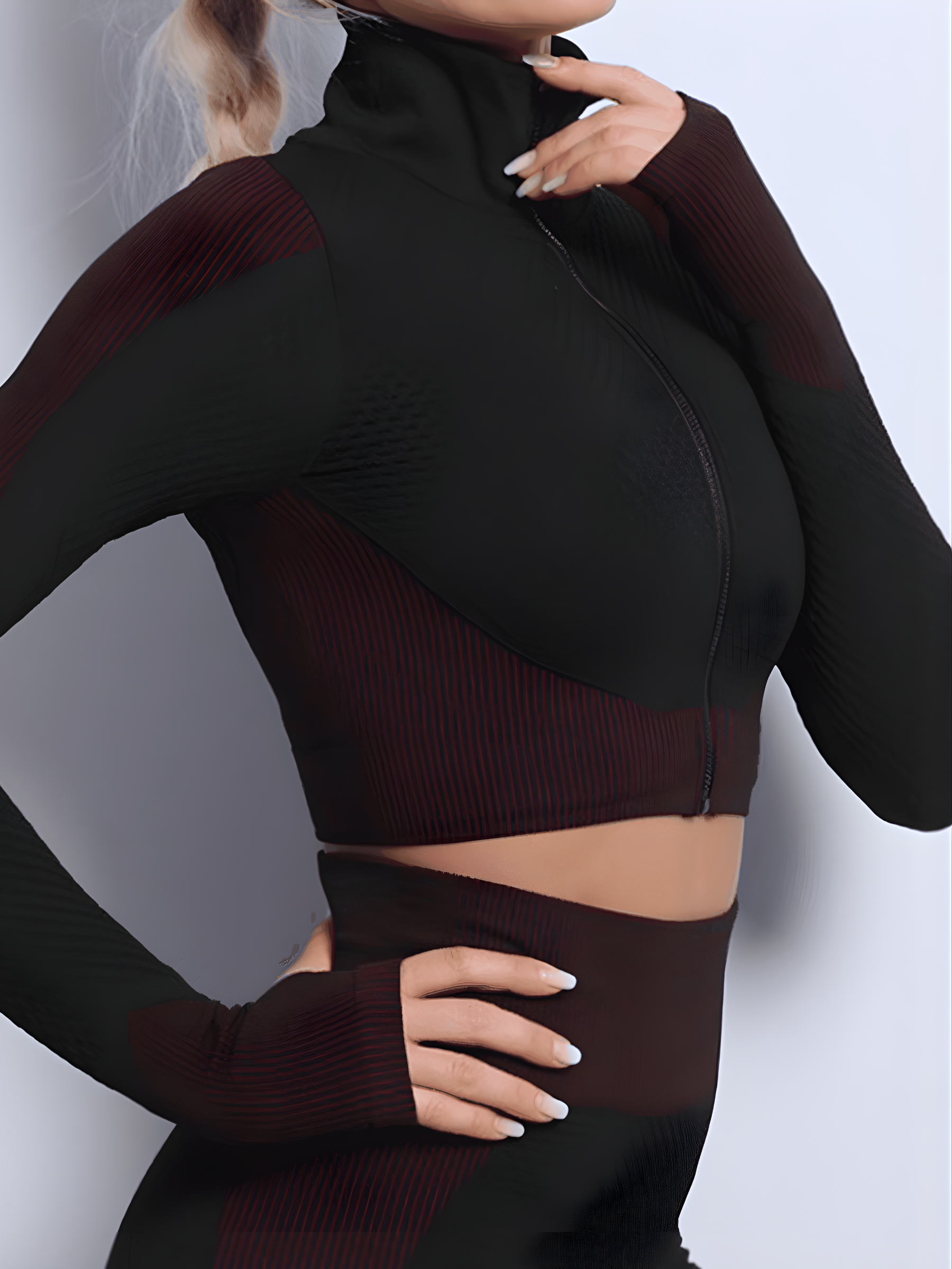 Woman wearing a fuchsia and black zippered cropped activewear BBL jacket designed by BodyFexx.