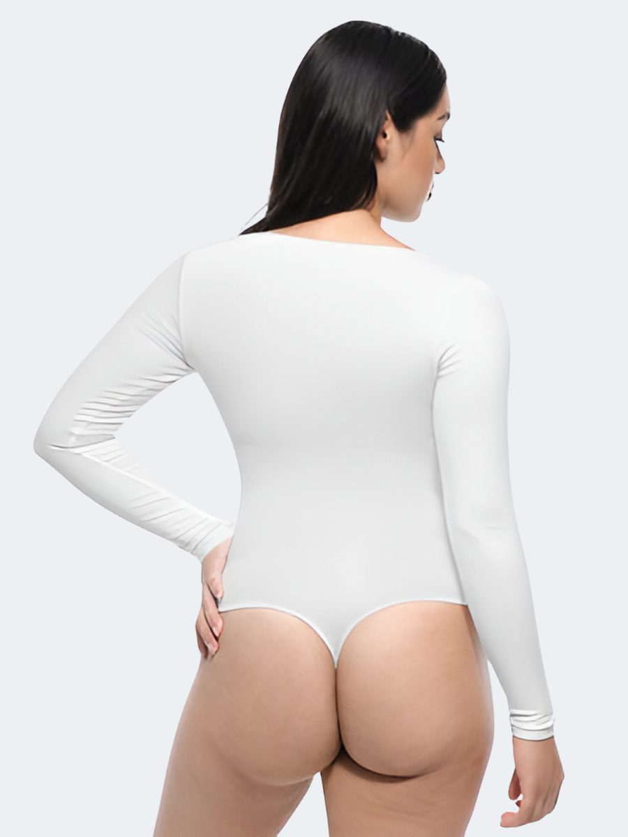 Back view of a woman wearing a white long-sleeve tummy-control thong shapewear bodysuit top by BodyFlexx.