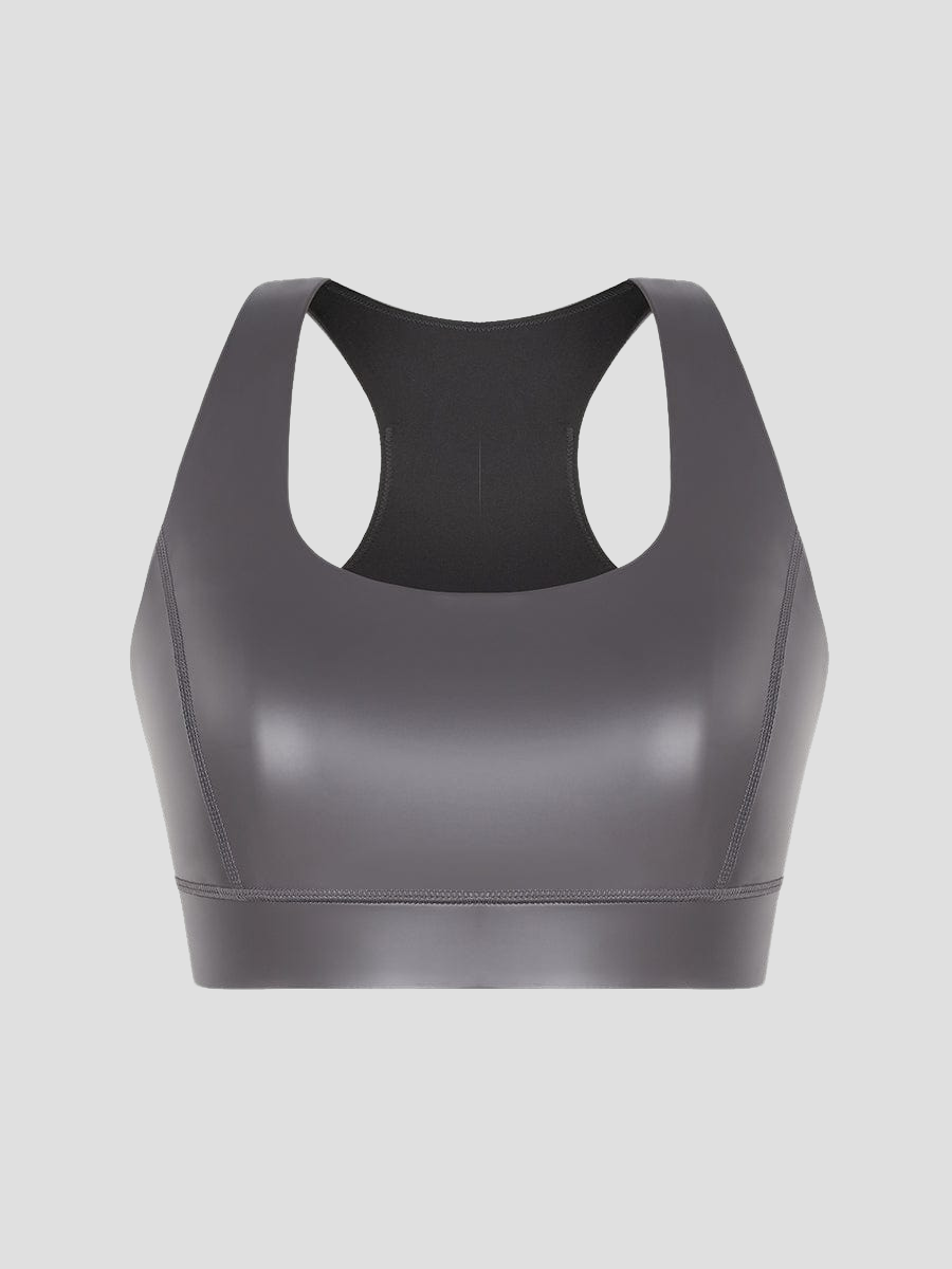 Close up of a silver metallic-like neoprene sauna sports bra by BodyFexx.