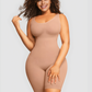Model wearing a beige/nude colored mid-thigh shaping bodysuit by BodyFlexx Shapewear.