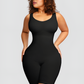 Woman wearing a seamless black mid-thigh shapewear bodysuit designed by BodyFlexx.