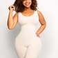 Woman wearing an ivory/white colored mid-thigh shapewear bodysuit by BodyFlexx.