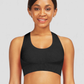 Woman wearing a black textured sports bra by BodyFlexx.