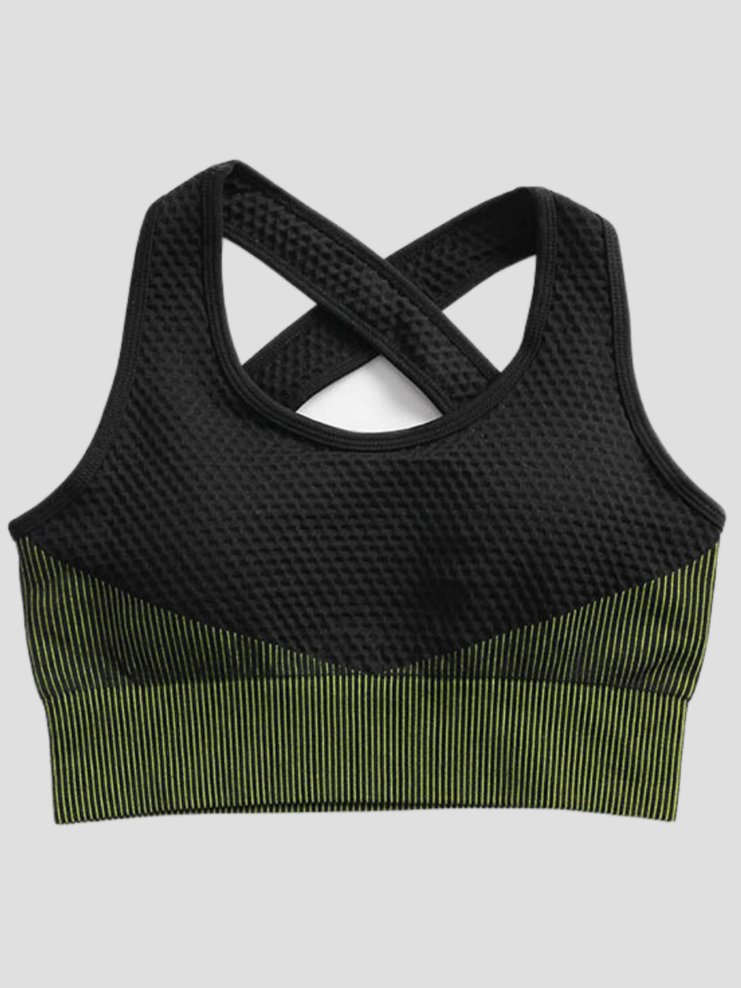 Padded black and green sports bra with a crisscross back and textured material by BodyFlexx.