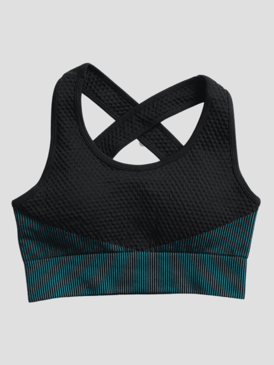 Textured black and teal sports bra with removable padding and criss-cross straps.