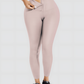 Woman wearing high waisted light pink waist training leggings with a 3 row hook-and-eye corset closure by BodyFlexx Shapewear.