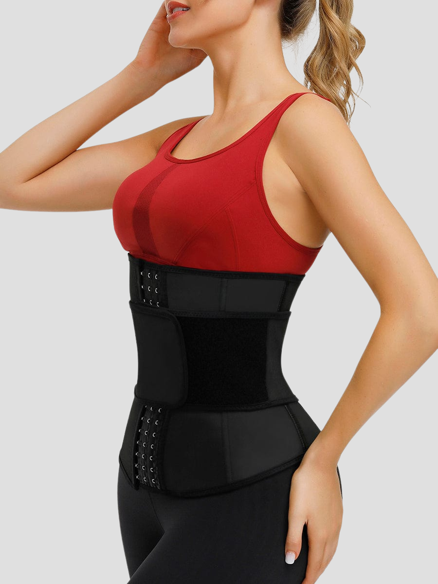 Side view of a woman wearing a black waist trainer showing the strong tummy and waist control.