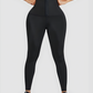 Woman wearing black waist-training sauna leggings by BodyFlexx.