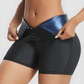 Woman wearing black BodyFlexx Waist-Training Sauna Shorts. She's opening the corset closure to show the blue neoprene lining.