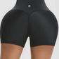 Woman wearing black Waist-Training Sauna Shorts with a corset closure by BodyFlexx.