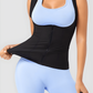 Woman wearing a neoprene-lined sauna vest by BodyFlexx over a blue activewear outfit.