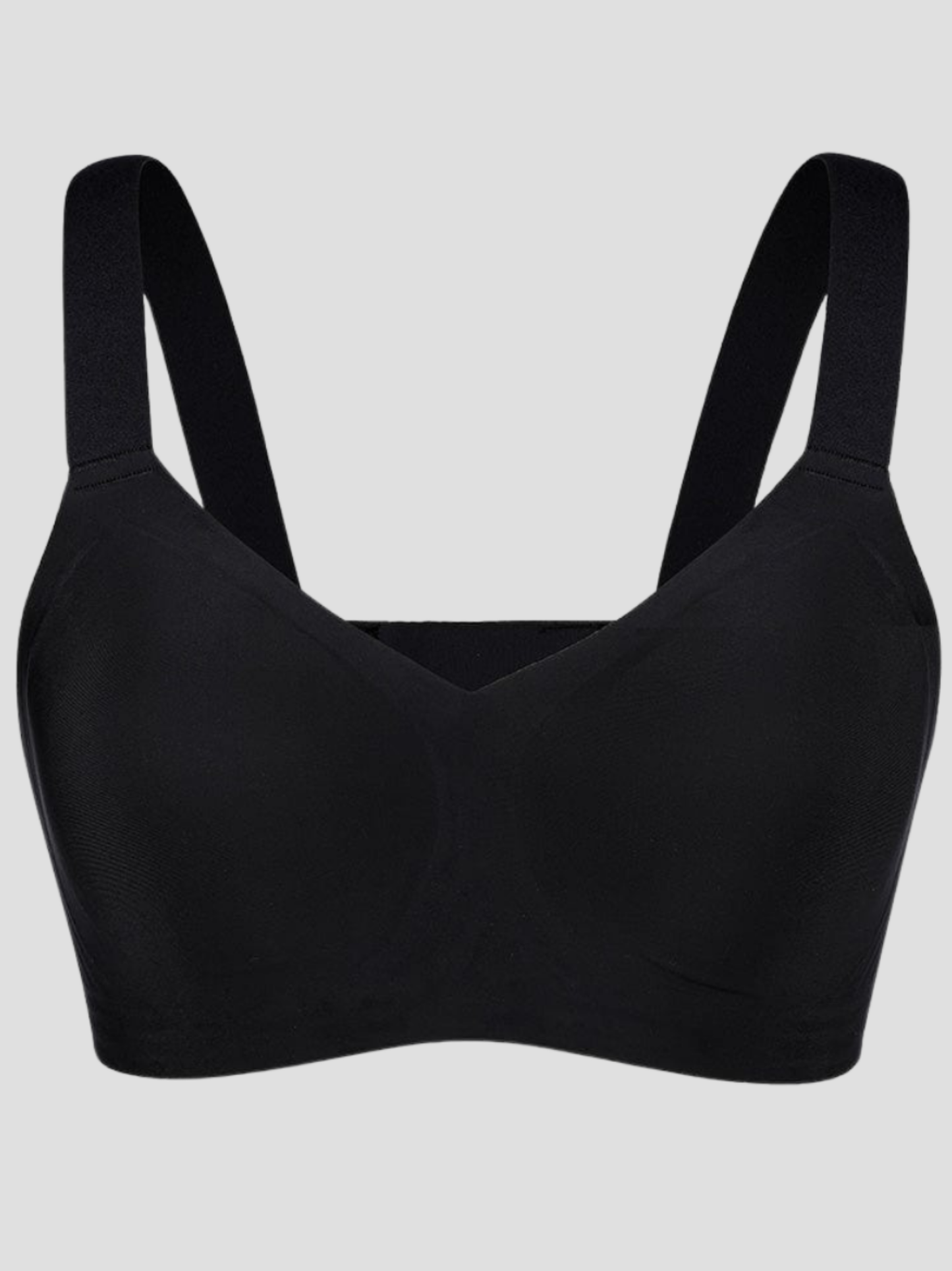 Close up of a wireless, seamless black t-shirt bra with wide adjustable straps and removable padding.