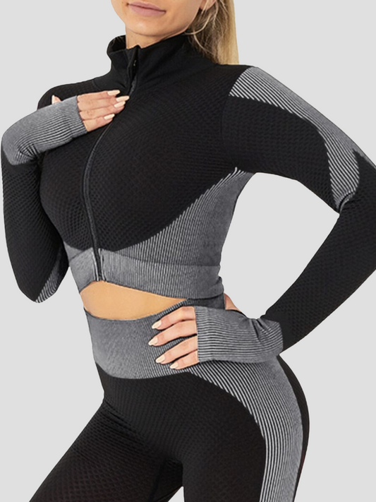 Cropped athletic set top with zipper stretchy jacket, workout outfit, athleisure, activewear, activewear sets, workout clothes for women, sweat-wicking, high compression, cellulite smoothing, BBL Jacket, plus size gym outfits, workout wear, gym wear, athletic outfits, nike, under armour, adidas, puma, champion, bombshell activewear, gymshark women, Girlfriend Collective, lululemon, Alo Yoga, Bandier, Athleta, Athletica, Fabletics, Revenge body, black, grey, gray, silver.