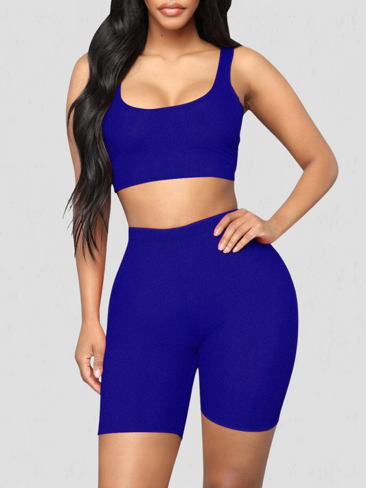 Activewear, activewear sets, sports bra, shorts, workout clothes for women, sweat-wicking, high waisted, breathable, workout wear, gym wear, athletic outfits, nike, under armour, adidas, puma, champion, bombshell activewear, gymshark women, Girlfriend Collective, lululemon, Alo Yoga, Bandier, Athleta, Athletica, Fabletics, Revenge body, blue.
