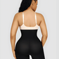 Woman wearing a black tummy control shapewear garment with removable bum padding for a curvy BBL-effect.