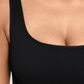 Close up view of the built-in bre with removable padding on BodyFlexx Shapewear's black sleeveless flared shaping jumpsuit.