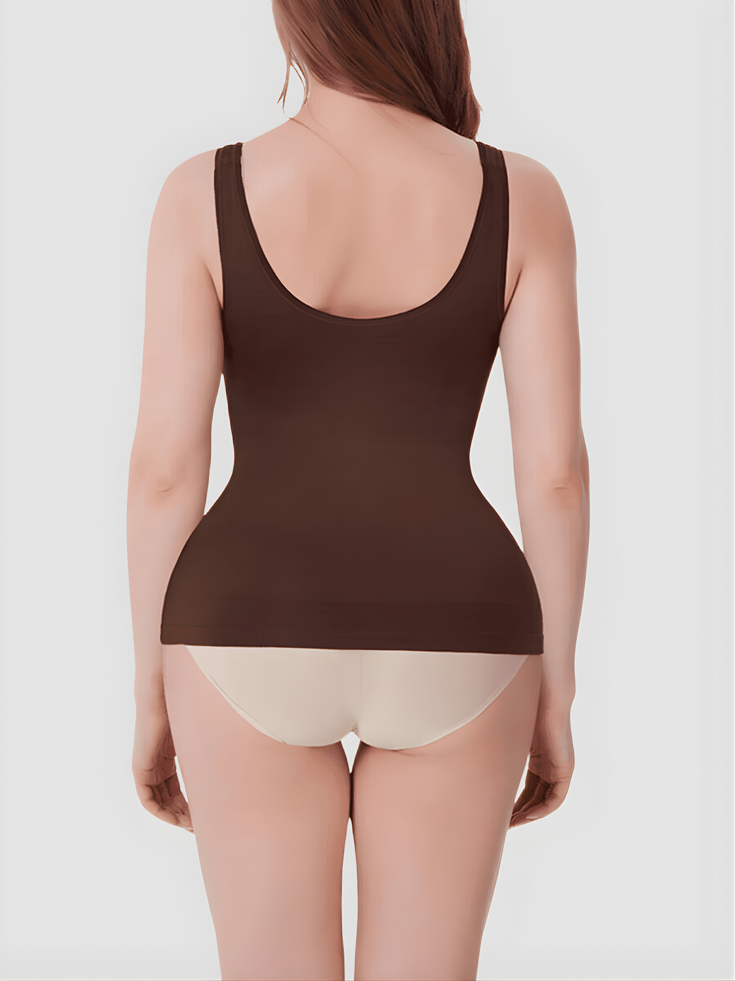 Woman wearing a brown shaping tank top by BodyFlexx Shapewear and beige underwear.