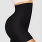 Woman wearing a black high-waisted shaping briefs with removable bum pads by BodyFlexx Shapewear.