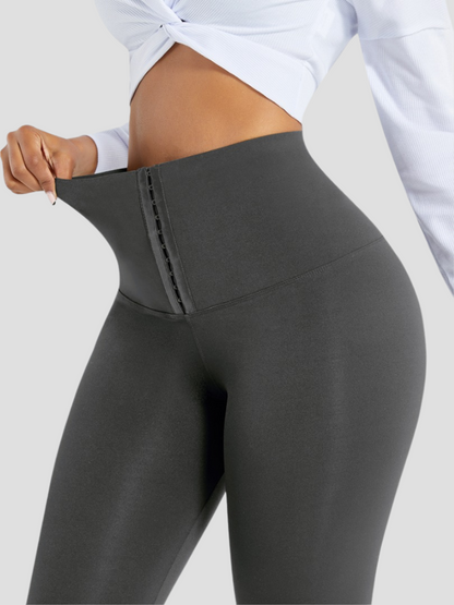 Waist Training Leggings, Gray, Grey, Corset Leggings, Activewear, booty-boosting, booty lifting, bum lifting, workout clothes for women, sweat-wicking, high compression, cellulite smoothing, waist cinching, BBL, seamless, squat proof, plus size gym outfits, high waisted, breathable, nike, under armour, adidas, puma, champion, bombshell activewear, gymshark women, Girlfriend Collective, lululemon, Alo Yoga, Bandier, Athleta, Athletica, Fabletics.