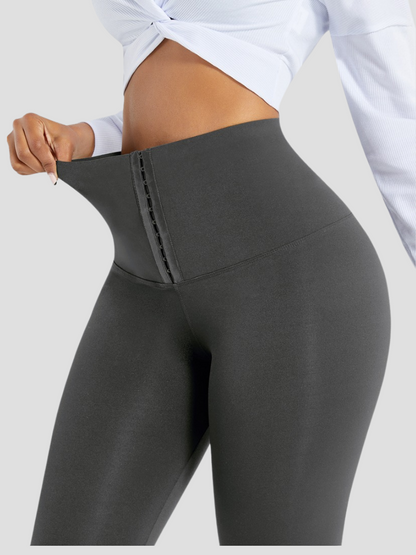 Waist Training Leggings, Gray, Grey, Corset Leggings, Activewear, booty-boosting, booty lifting, bum lifting, workout clothes for women, sweat-wicking, high compression, cellulite smoothing, waist cinching, BBL, seamless, squat proof, plus size gym outfits, high waisted, breathable, nike, under armour, adidas, puma, champion, bombshell activewear, gymshark women, Girlfriend Collective, lululemon, Alo Yoga, Bandier, Athleta, Athletica, Fabletics.